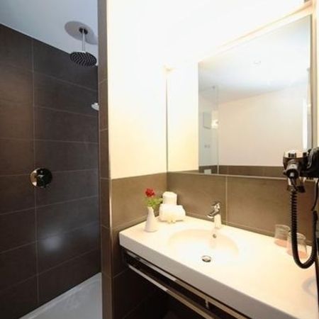 Einblick in ein Badezimmer im neuen Landhotel